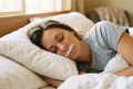 Woman sleeping peacefully wearing a Hushvale mouth tape strip in a sunlit bedroom